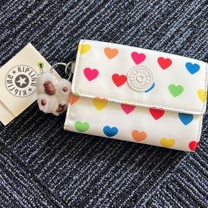 Kipling wild hearts white wallet Size  5.75" x 4.25"   
Style: AC3739
Pixi Nylon